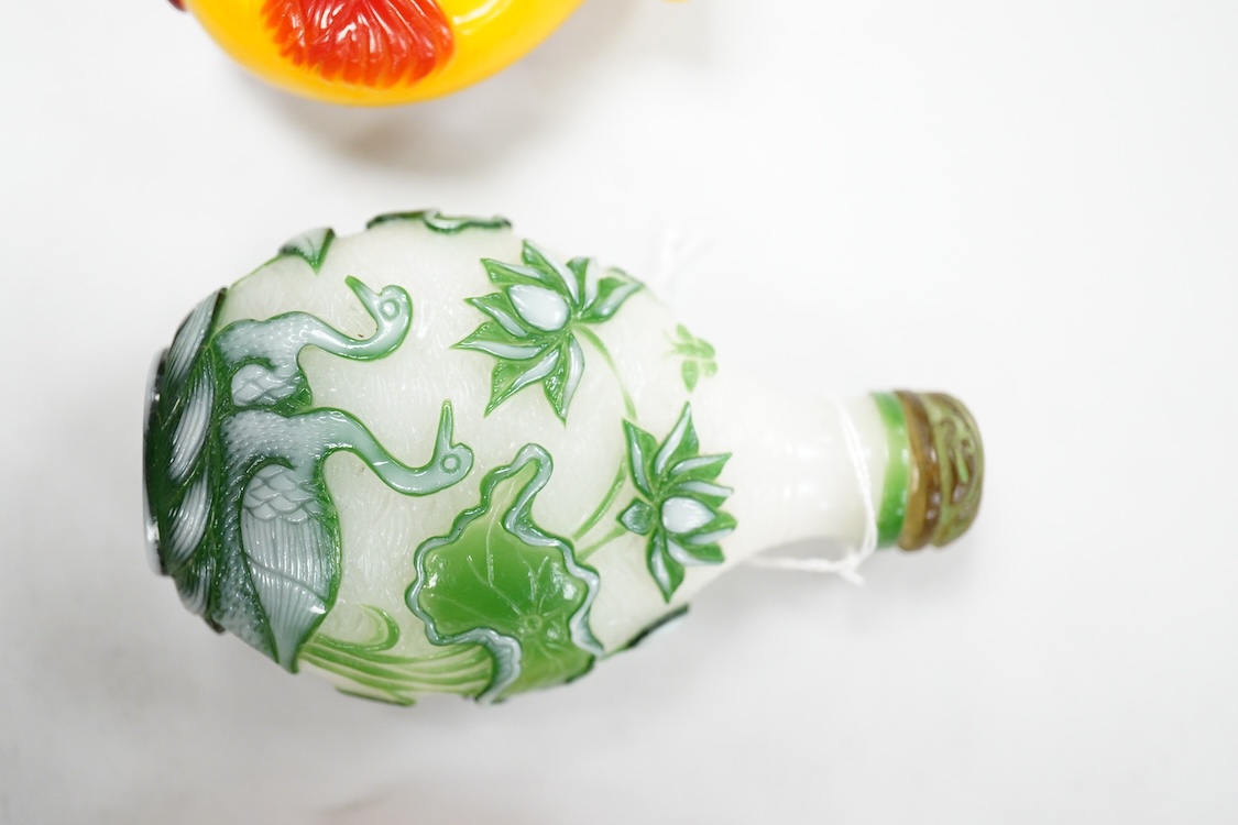 Three Chinese glass snuff bottles and a porcelain snuff bottle(4), tallest 8cm high